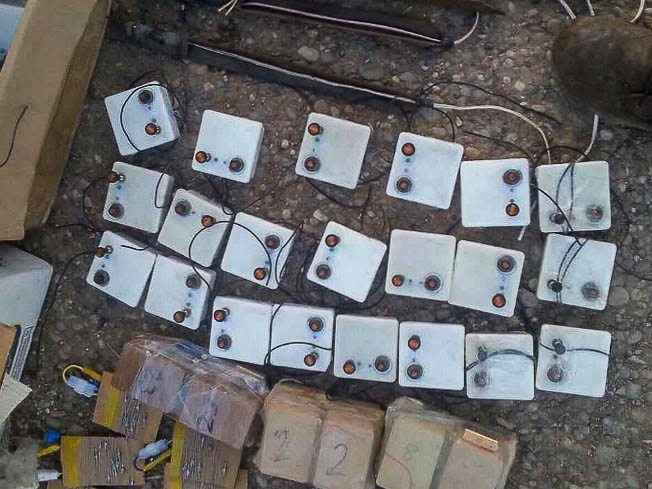 SVBIED detonation mechanisms (pictured center) captured in an ISF raid in Mosul.